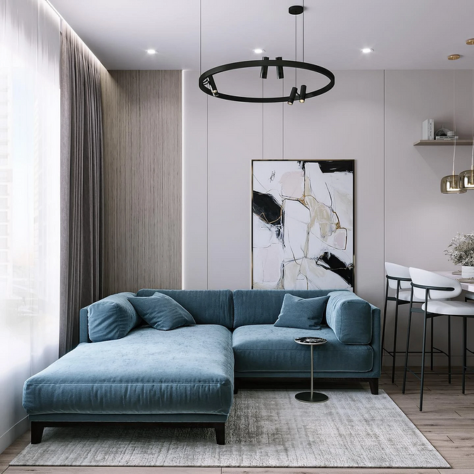Кутовий диван з оббивкою нейтрального кольору в сучасному інтер'єрі вітальні.