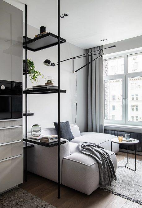 Кутовий диван біля стіни: оптимальне розміщення меблів у вітальні