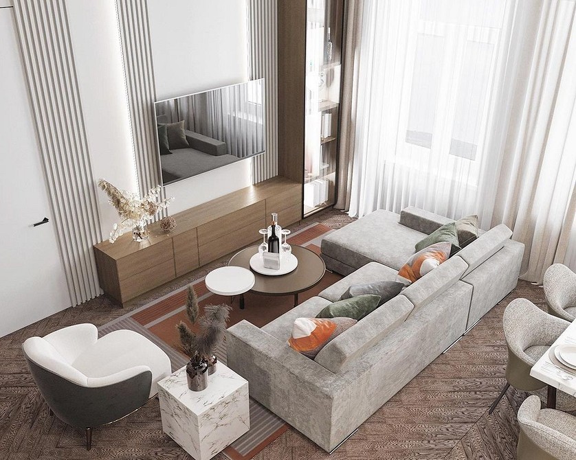 Кутовий диван біля вікна у вітальні: затишний інтер'єр з м'якими меблями