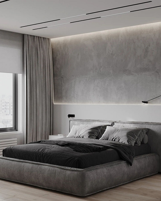 Ліжко з великим тканинним узголів'ям, сучасний дизайн та комфорт в спальні.