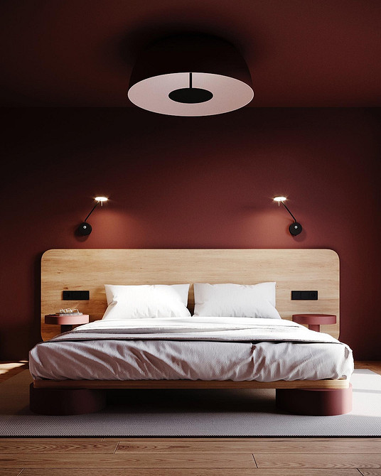 Елегантне ліжко з великим узголів'ям, що додає розкоші спальні.