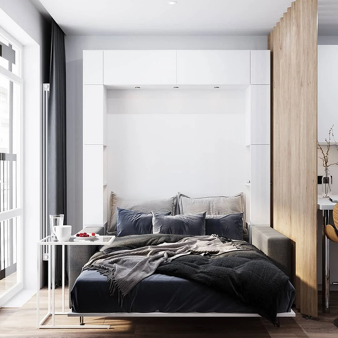 Ліжко з великим узголів'ям як ключовий елемент сучасного дизайну спальні.