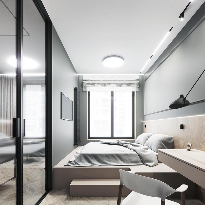 Сучасна спальня з ліжком-подіумом, мінімалістичний дизайн та місця для зберігання.