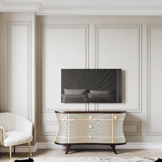 Тумба під телевізор з глянцевими фасадами в сучасному інтер'єрі