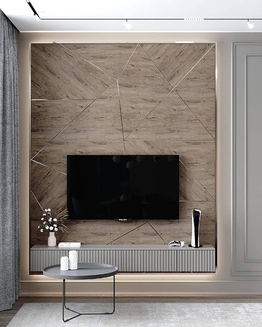 Тумба під телевізор з підсвіткою, що створює затишну атмосферу у вітальні.