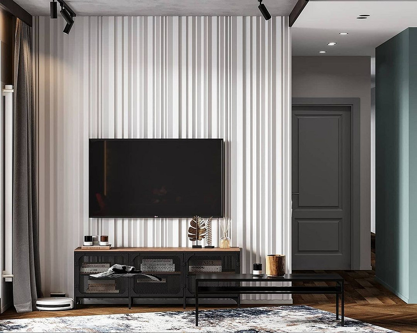 Довга тумба під телевізор для великої вітальні, забезпечує багато місця для зберігання.