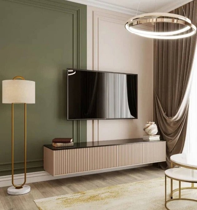 Кутова тумба під телевізор для ефективного використання простору в кімнаті.