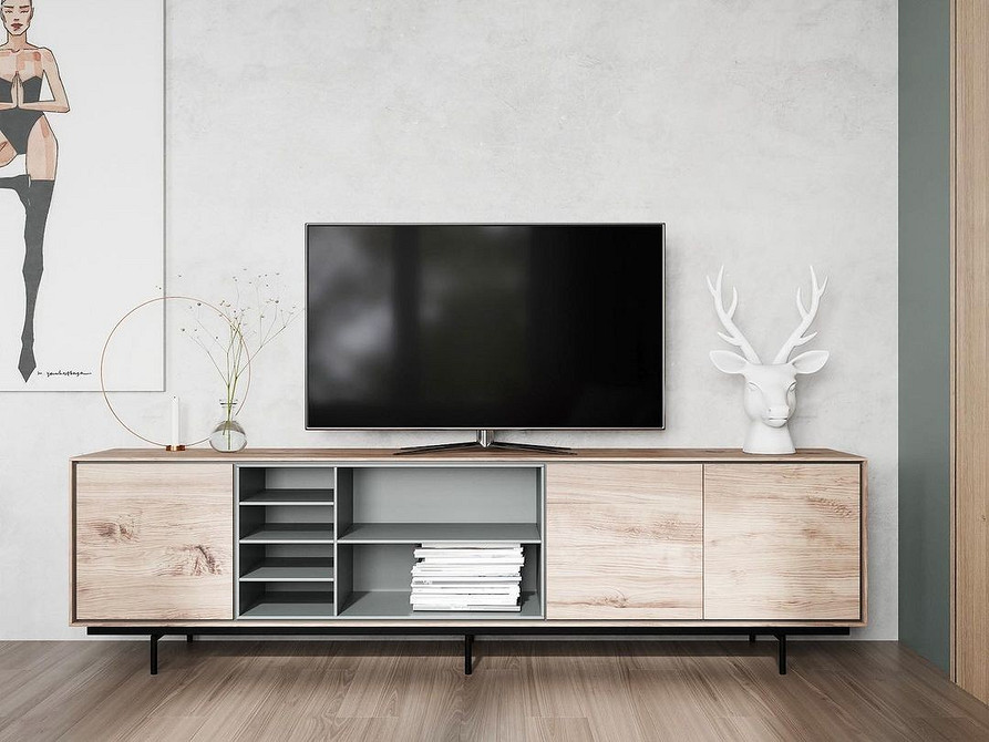 Кутова тумба під телевізор для оптимального використання простору в кімнаті.