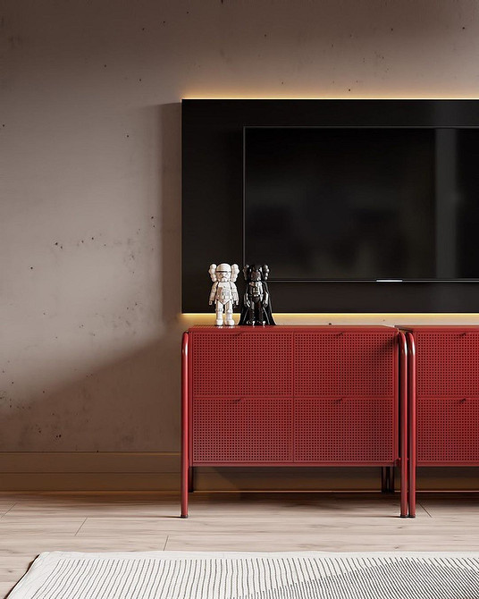 Біла тумба під телевізор з висувними шухлядами для зберігання речей.