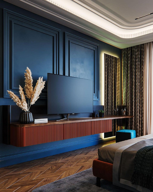 Кутова тумба під телевізор для ефективного використання простору в кімнаті.