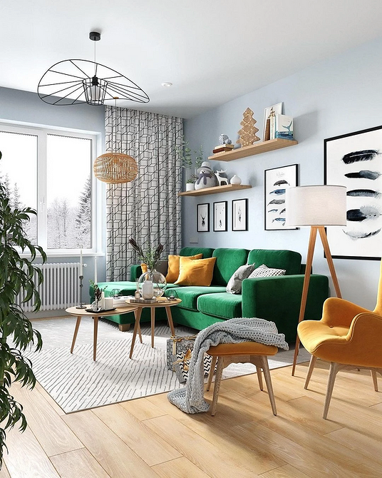 Зелений диван в інтер'єрі з декоративними подушками, текстиль для дому