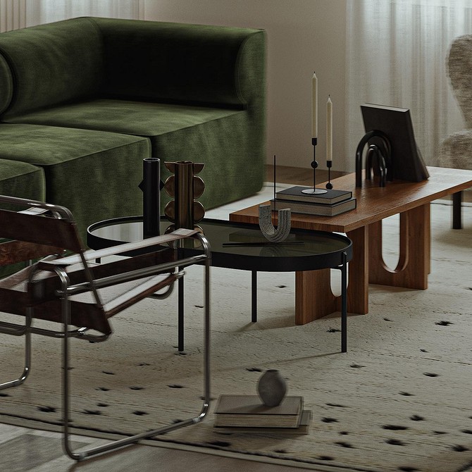 Вітальня з темно-зеленим диваном, килимом з геометричним принтом та сучасним дизайном, поєднання кольорів.