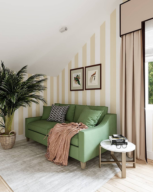 Зелений диван в сучасному інтер'єрі, поєднання з різними кольорами та текстилем.