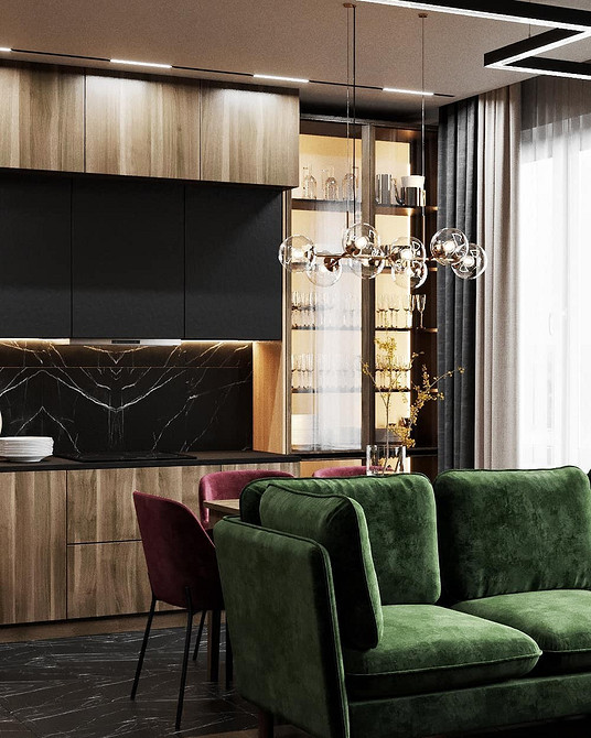 Комфортний зелений диван, в оточенні текстилю, кольорів та декоративних елементів.