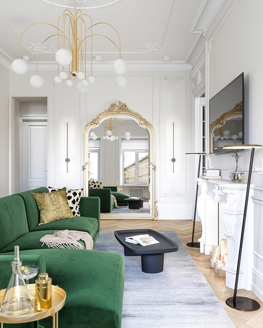 Інтер'єр з зеленим диваном, акцент на кольорах та текстилі для створення гармонії.