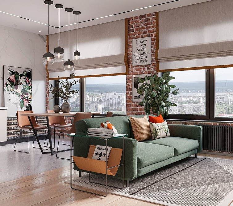 Зелений диван, декоративні подушки та штори в гармонійному поєднанні кольорів.