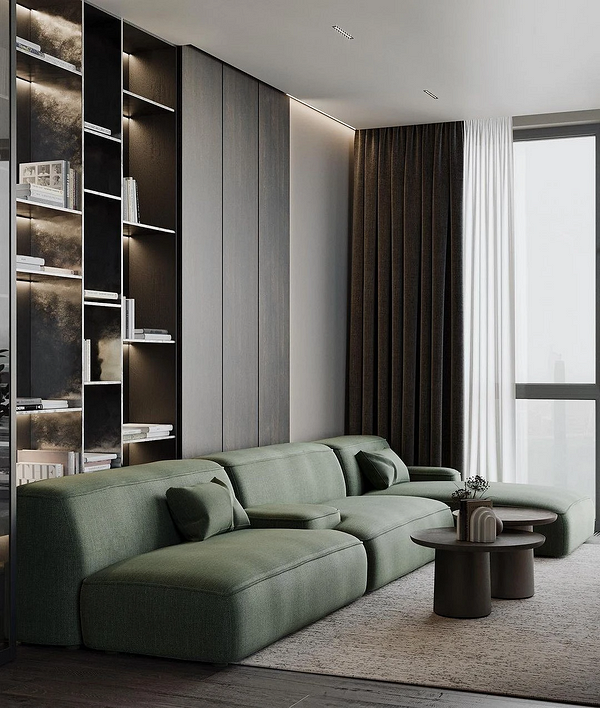 Елегантний зелений диван, поєднання з декоративними подушками та шторами в тон.