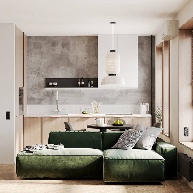 Сучасний зелений диван з м'яким текстилем в інтер'єрі кімнати.