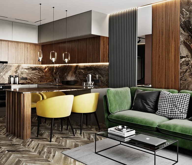 Зручний зелений диван в інтер'єрі з використанням різноманітного текстилю та кольорів