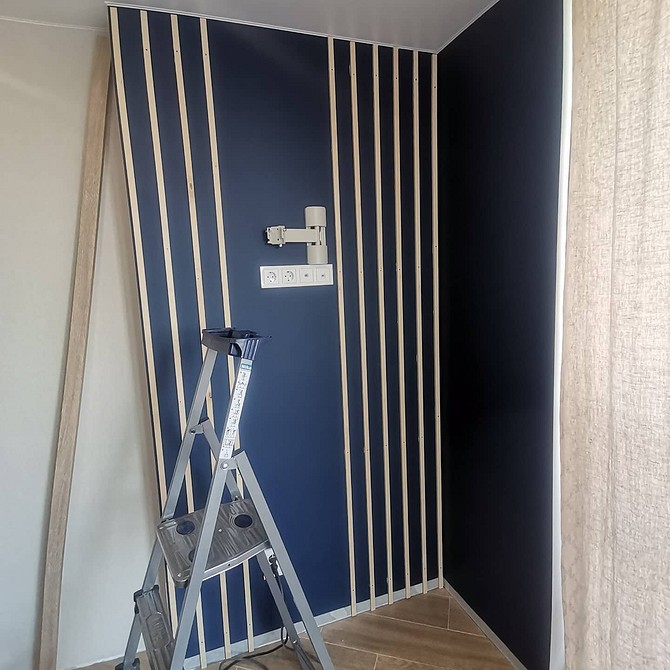 Приклад використання декоративних рейок з МДФ зі шпоном для створення елегантного інтер'єру