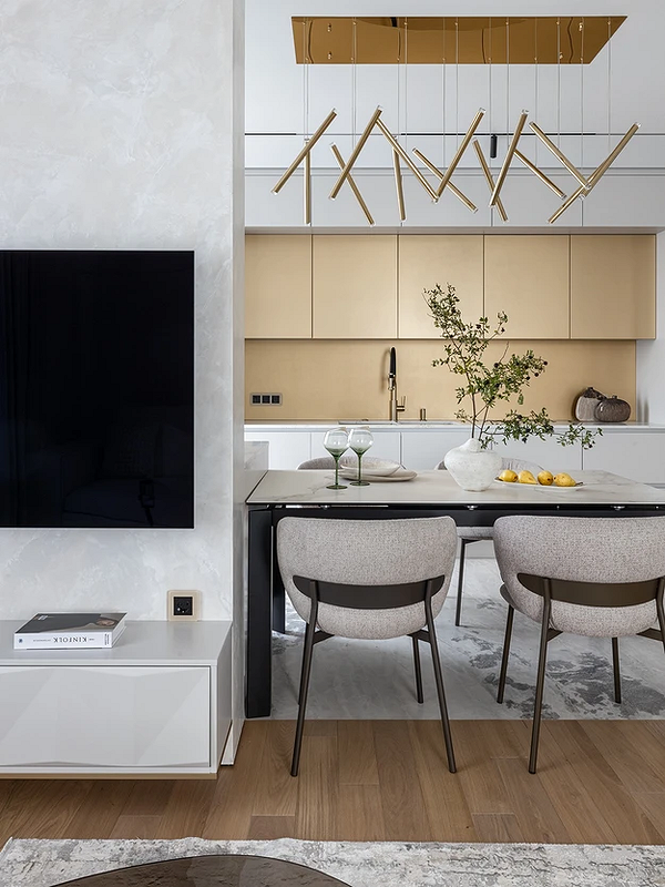 Чорний акцент Обідня зона з акцентним освітленням: стильний чорний світильник над столом.