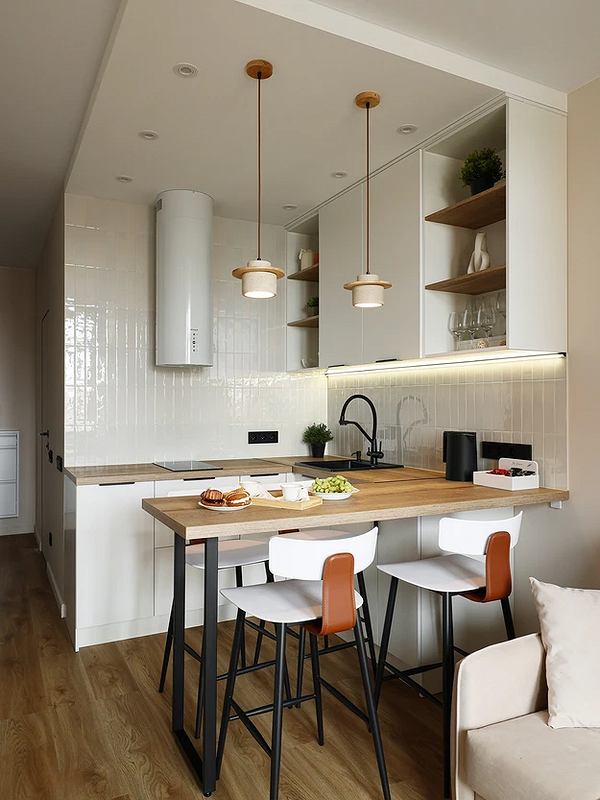 Скандинавський затишок Стильна обідня зона з сучасним світильником над столом у скандинавському стилі.