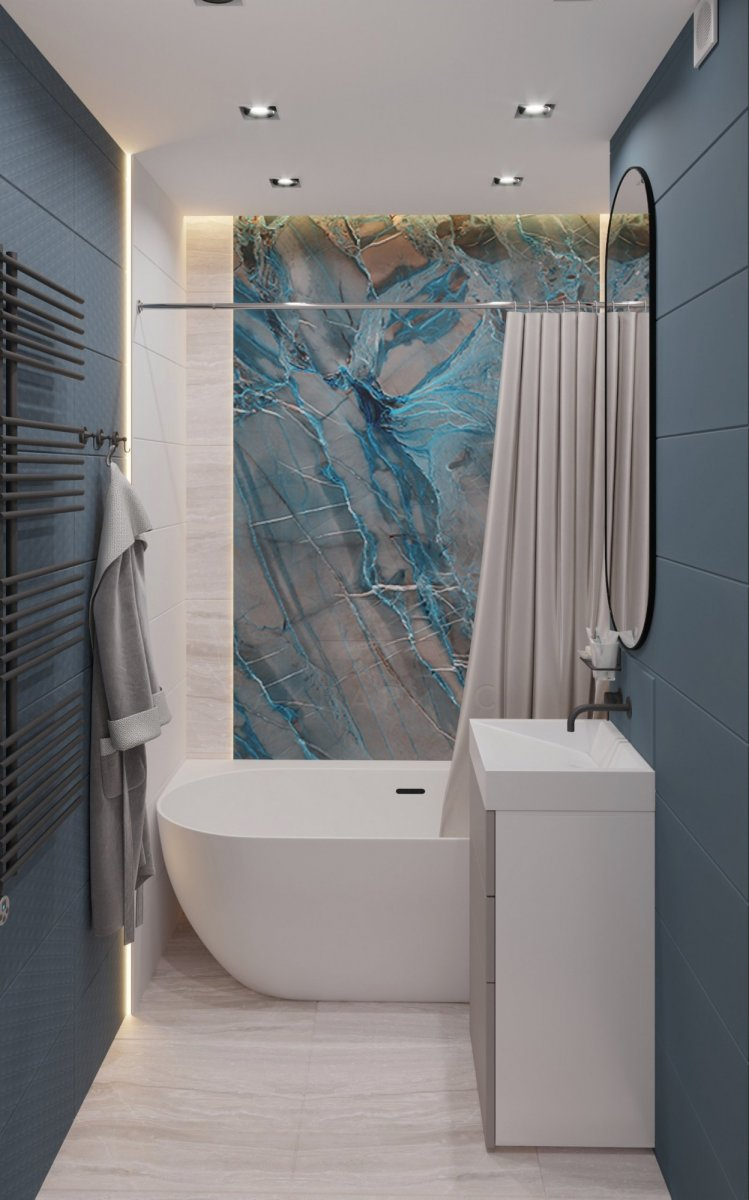 Морська тематика ванної Штора у ванній кімнаті з малюнком морської тематики, що створює атмосферу відпочинку.