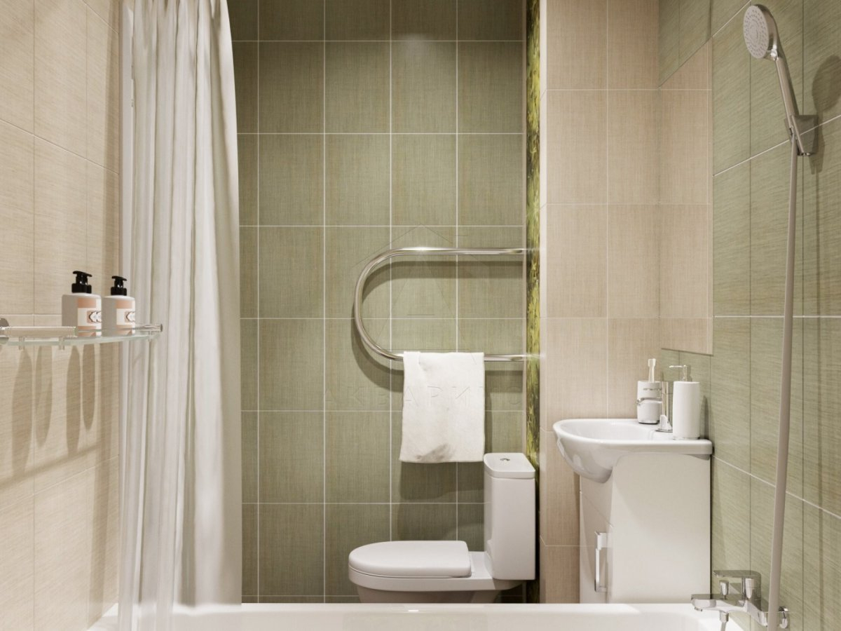 Затишок та захист Сучасна ванна кімната з прозорою шторою, що захищає від бризок води.